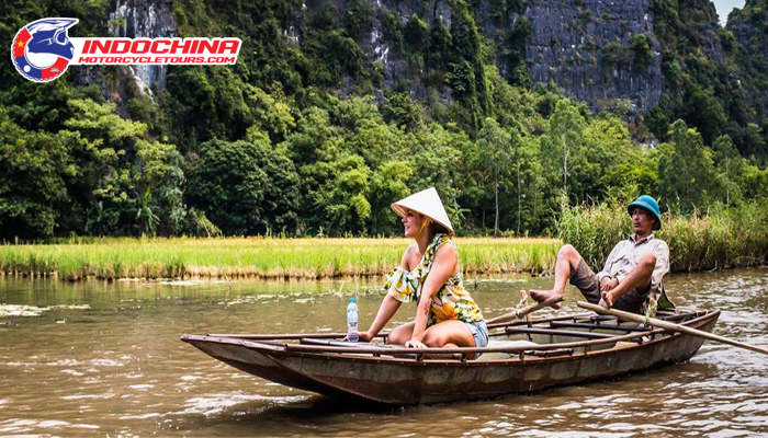 Gliding through the golden hue of Tam Coc is the best thing to do in Ninh Binh