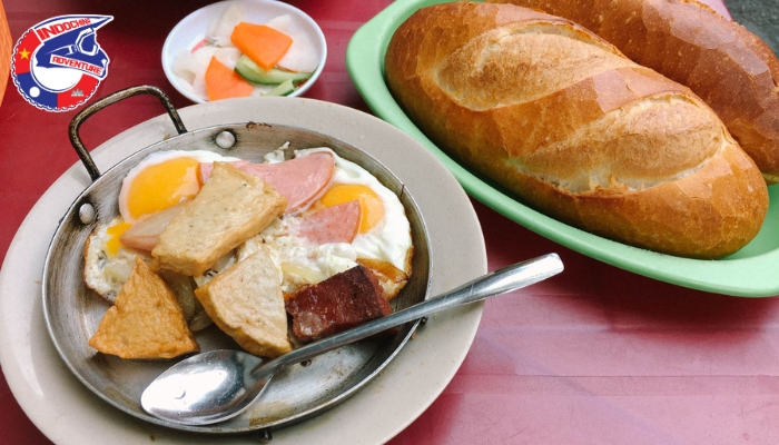 A delicious loaf of bread with full of topping pan