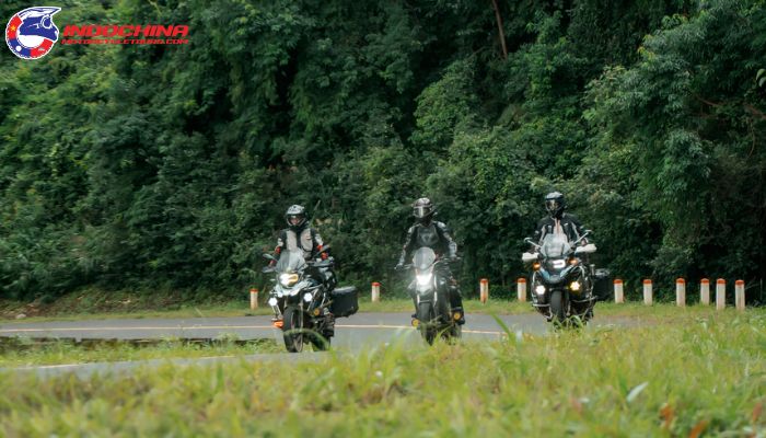 Motorcyclist riding through a breathtaking Vietnam landscape