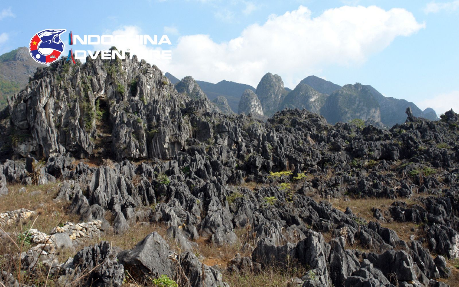 The rugged limestone formations of the Karst Plateau, a highlight in any Dong Van travel guide