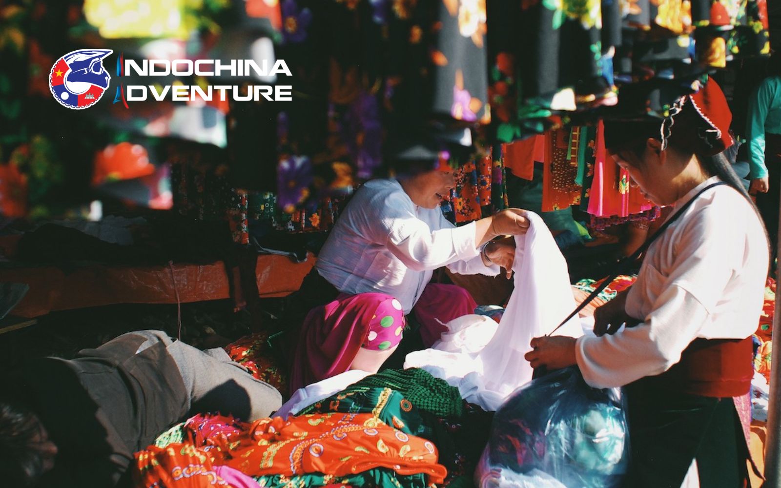 Colorful stalls and vibrant activity at Dong Van Market, a must-see spot in the Dong Van travel guide