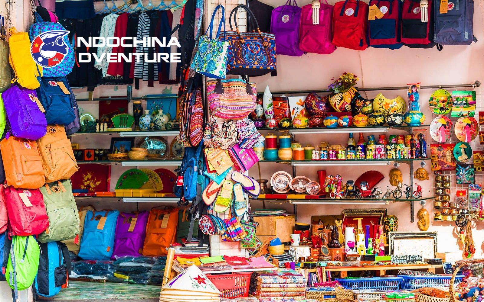Tourists exploring Hang Da Market and buying handmade souvenirs