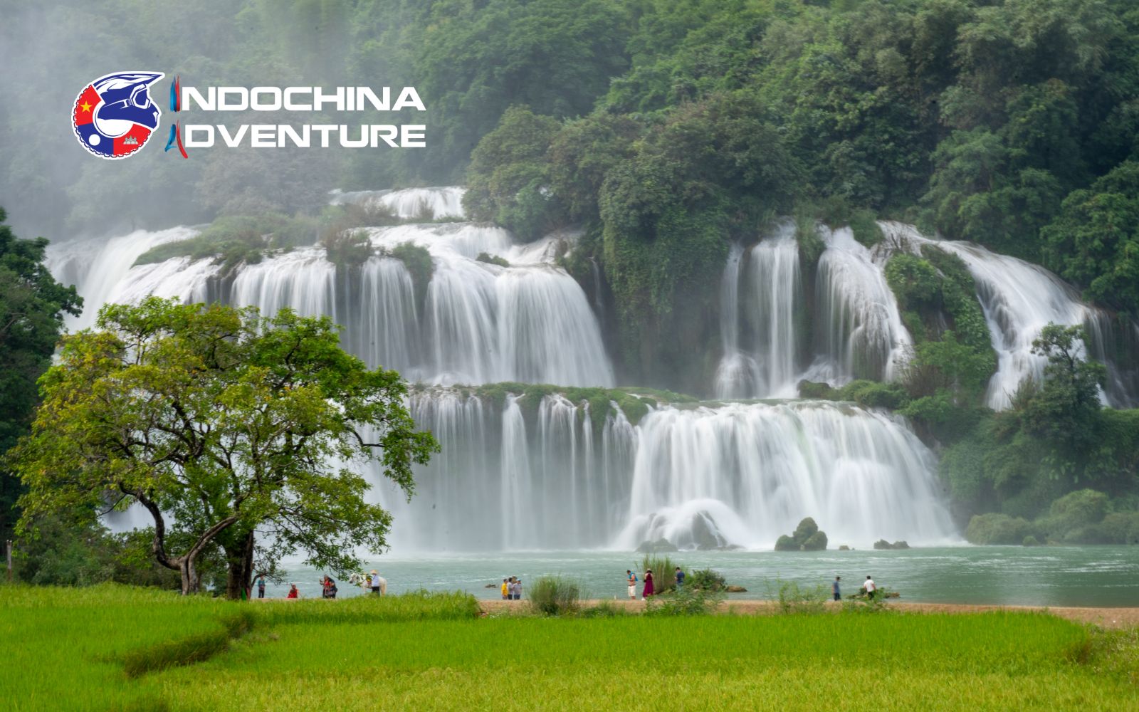 Ban Gioc Waterfall landscape in late October with clear water and lush surroundings