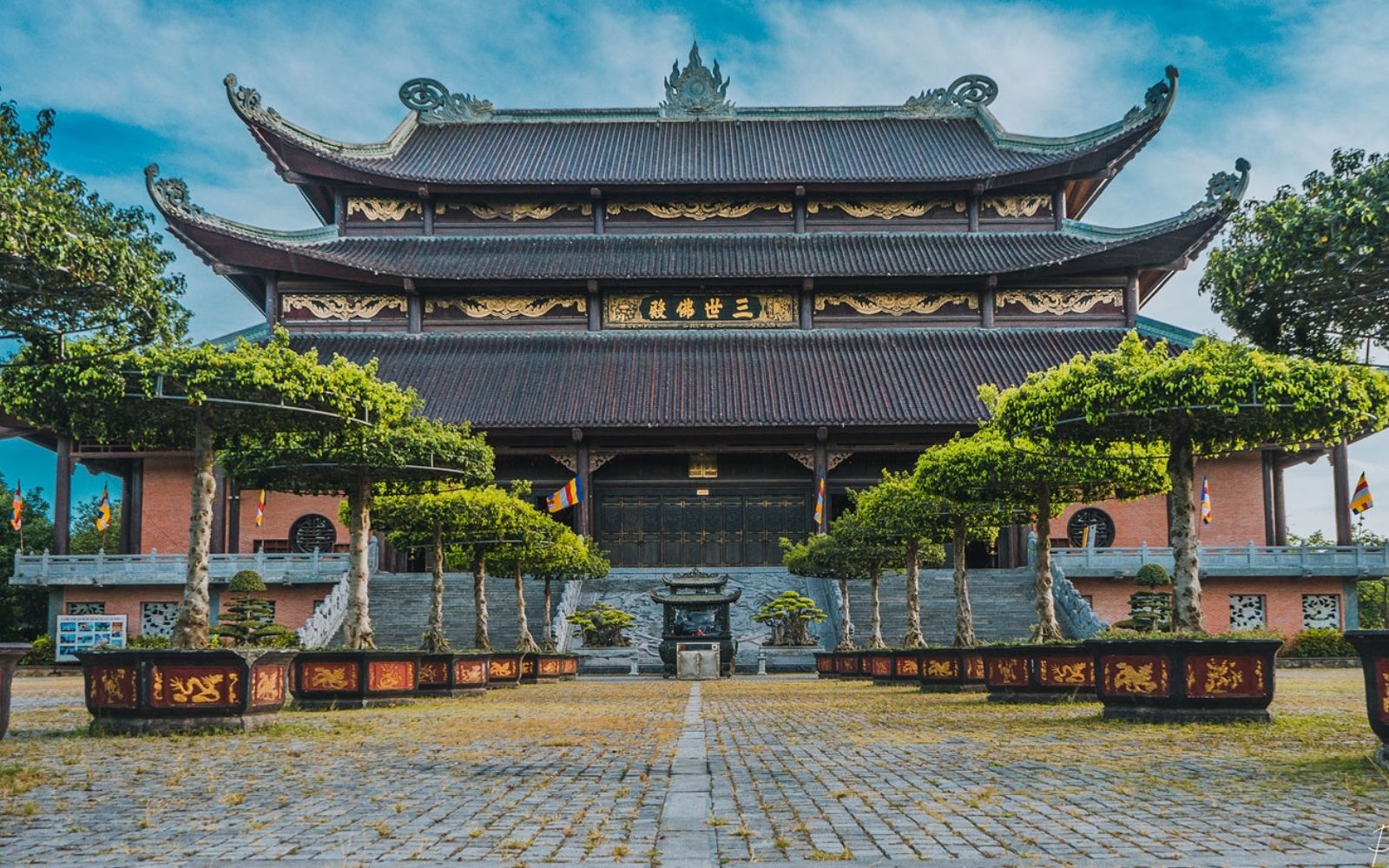 Admire towering statues and sacred halls in Vietnam’s largest pagoda