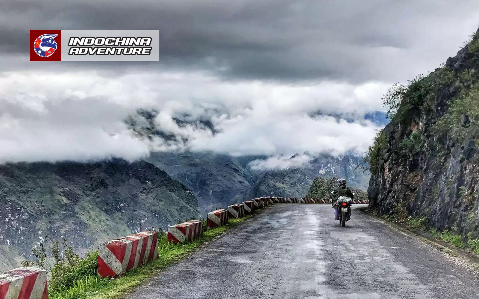 Riders on Ma Pi Leng Pass overlooking deep valleys