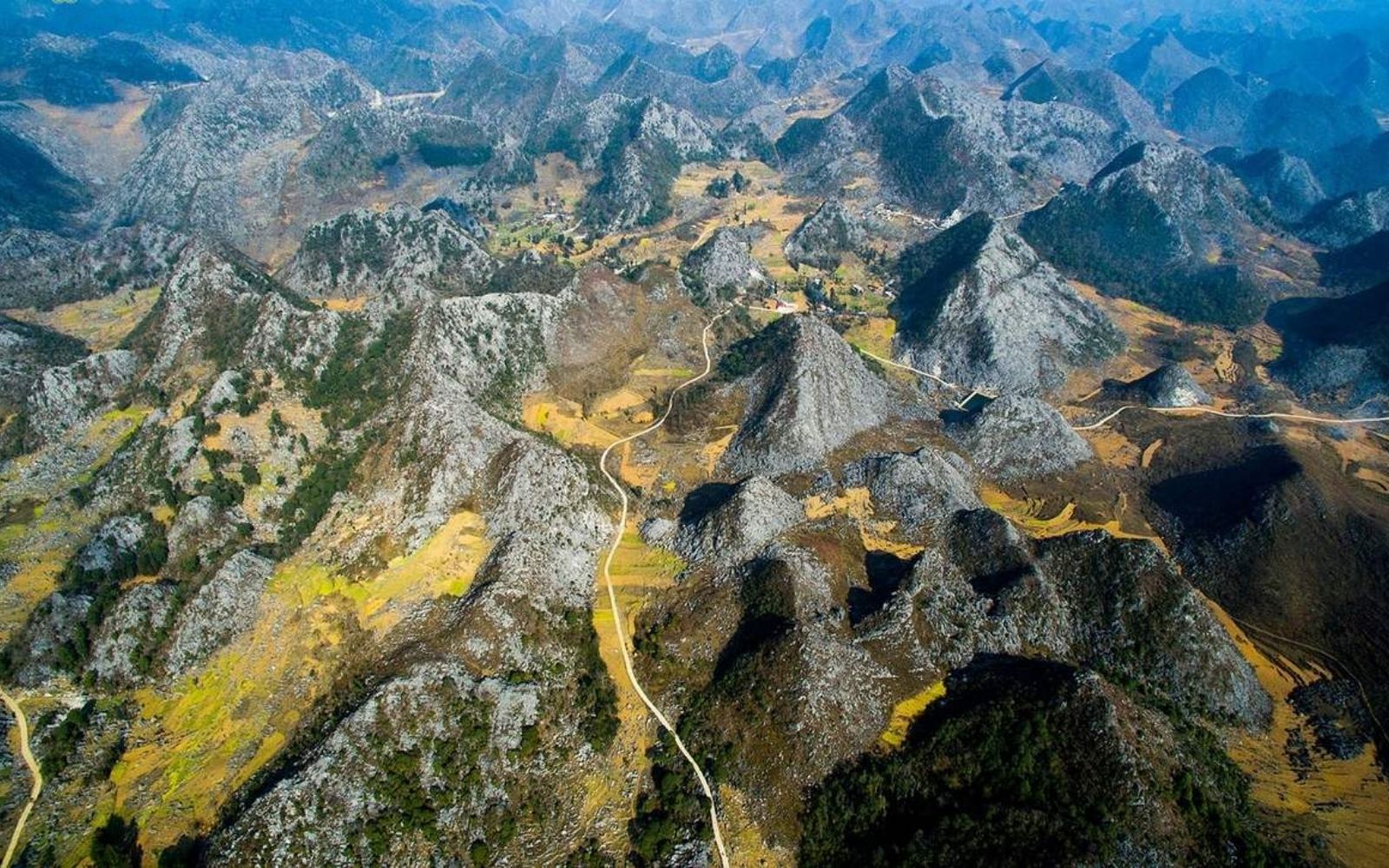 Marvel at the ancient rock formations and spectacular landscapes in Dong Van Karst Plateau Geopark