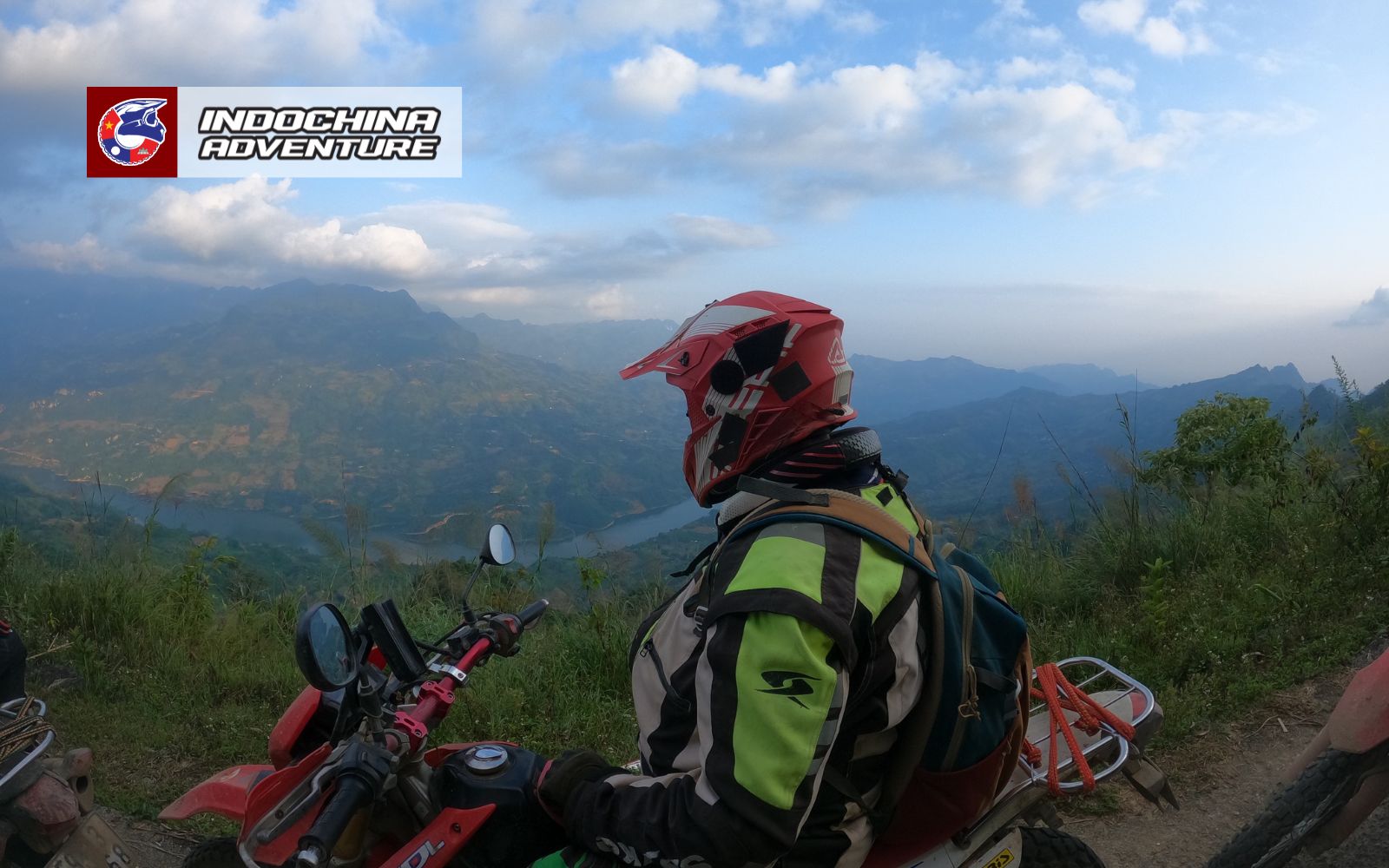Bikers on the Ha Giang Loop, passing limestone peaks