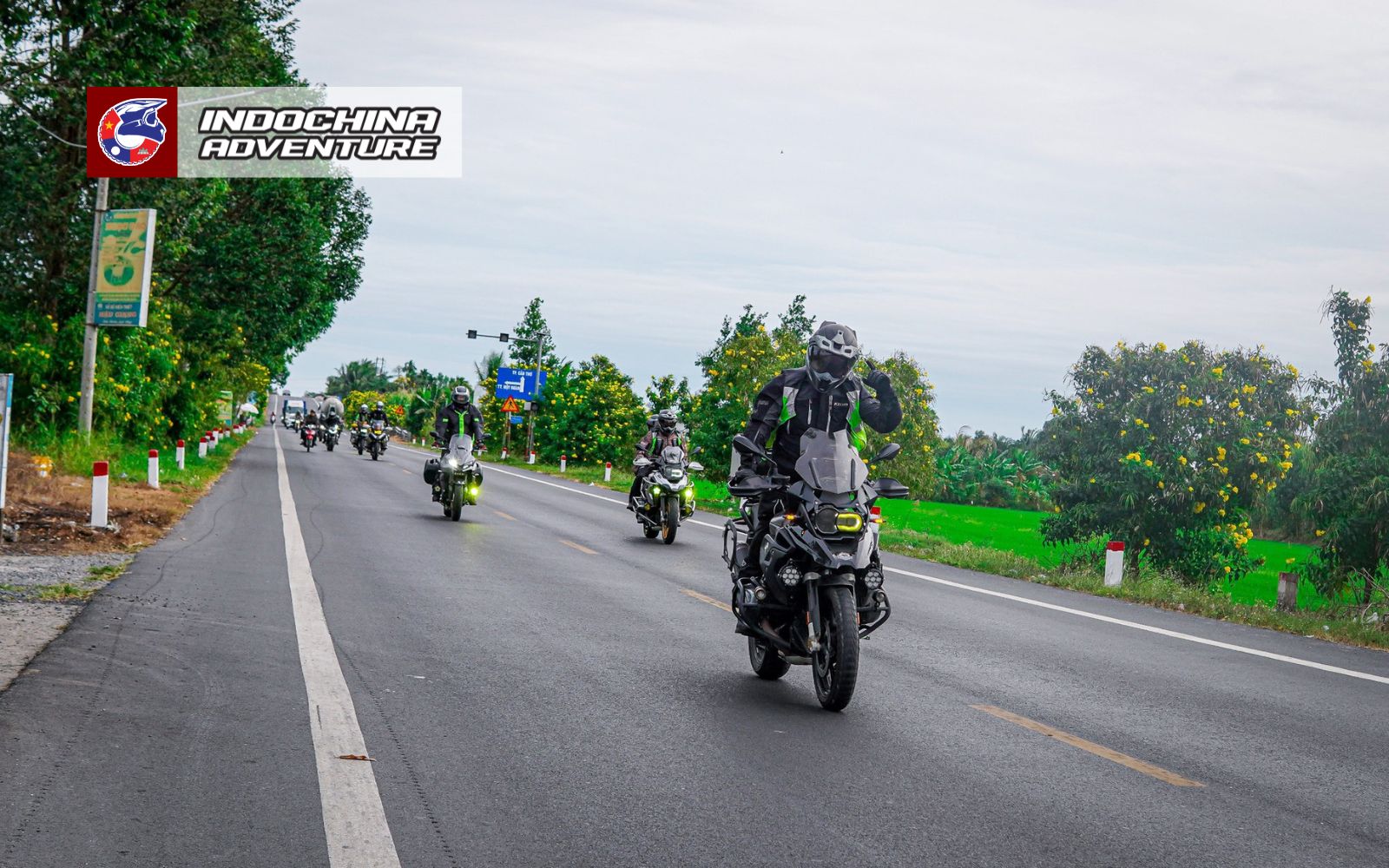 Solo rider and group tour on Vietnam roads