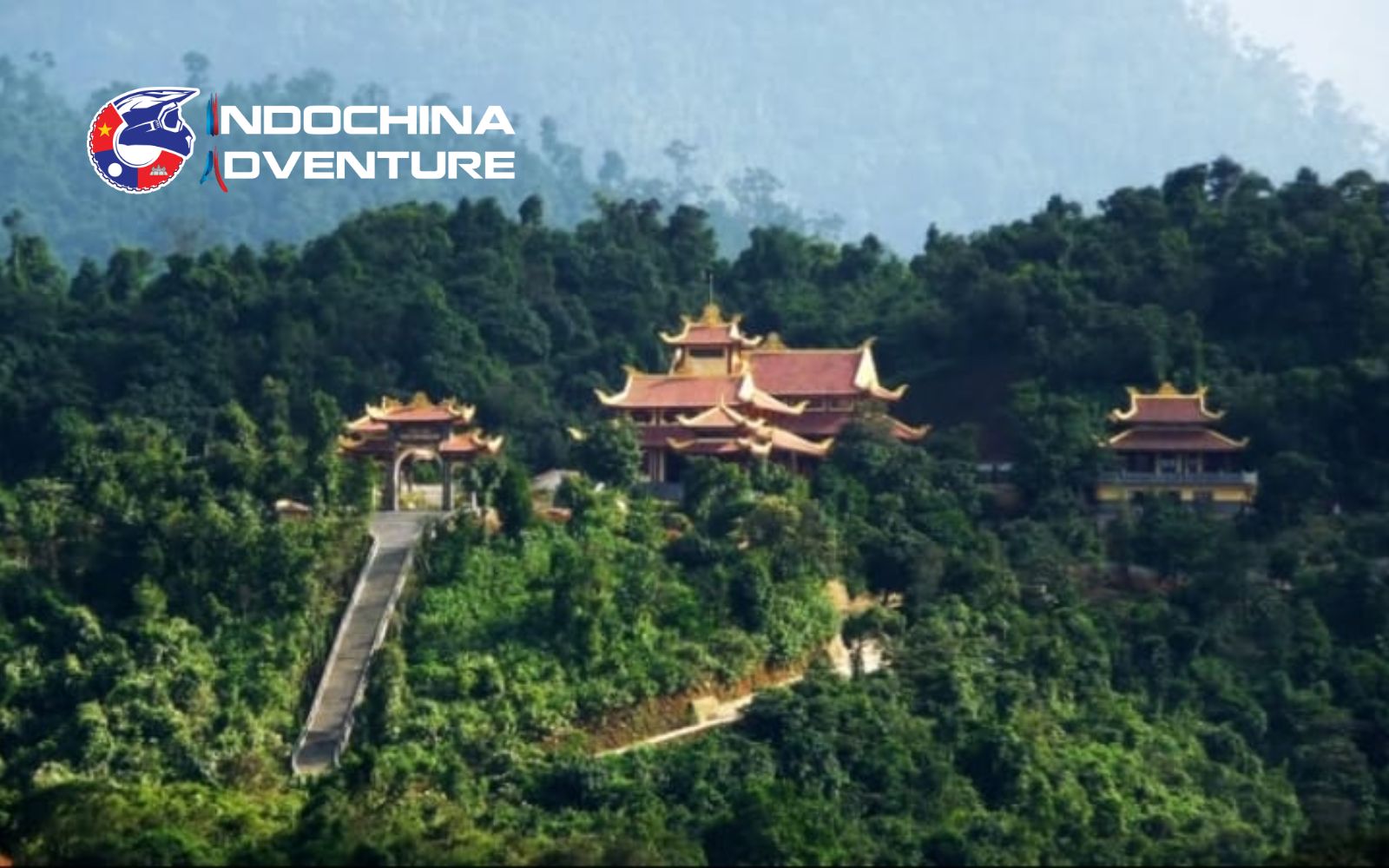Hidden mountain pagoda reached by a winding path on a motorbike tour Ha Long