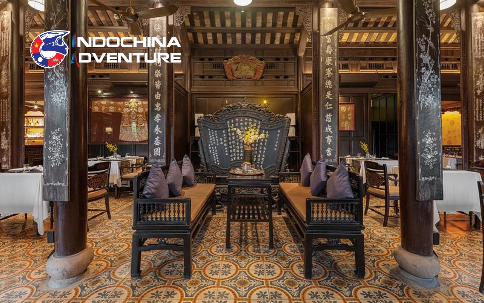 Enjoy warm imperial dishes that suit the Hue rainy season atmosphere Traditional Hue meal served in a quiet indoor setting in Hue rain months