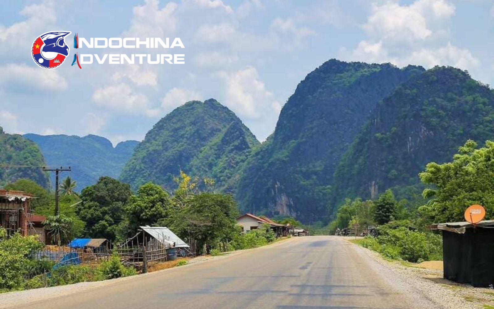 Embark on the Thakhek Loop and ride through Laos' rugged terrain, from lush forests to dramatic cliffs and caves