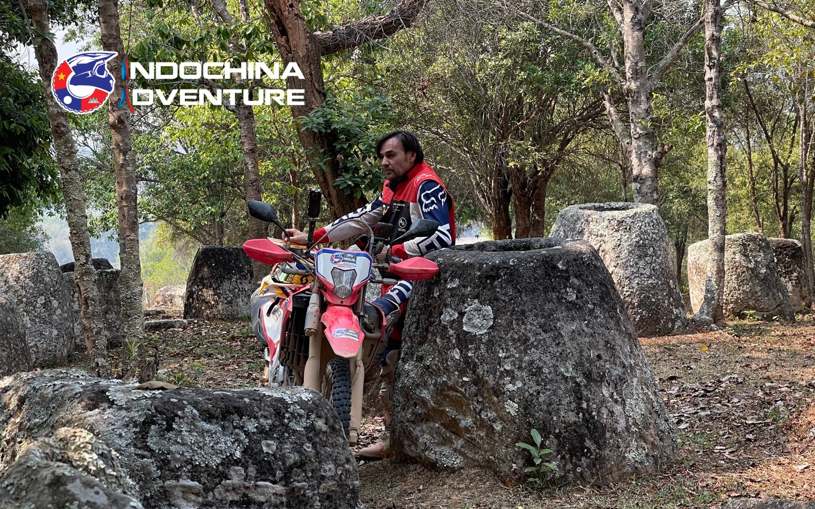 Uncover the mysteries of the Plain of Jars on a Laos motorbike tour, where ancient stone jars continue to puzzle historians