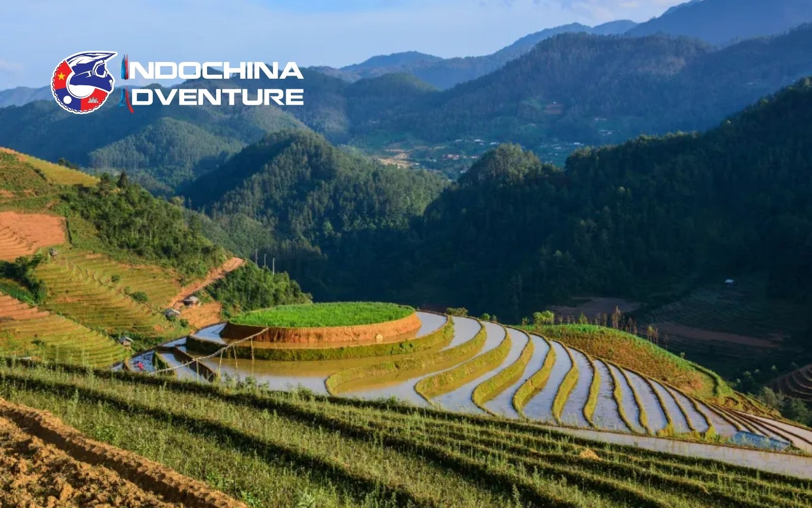 Terraced fields are freshly flooded, creating mirror-like reflections across the valleys Sapa in early May