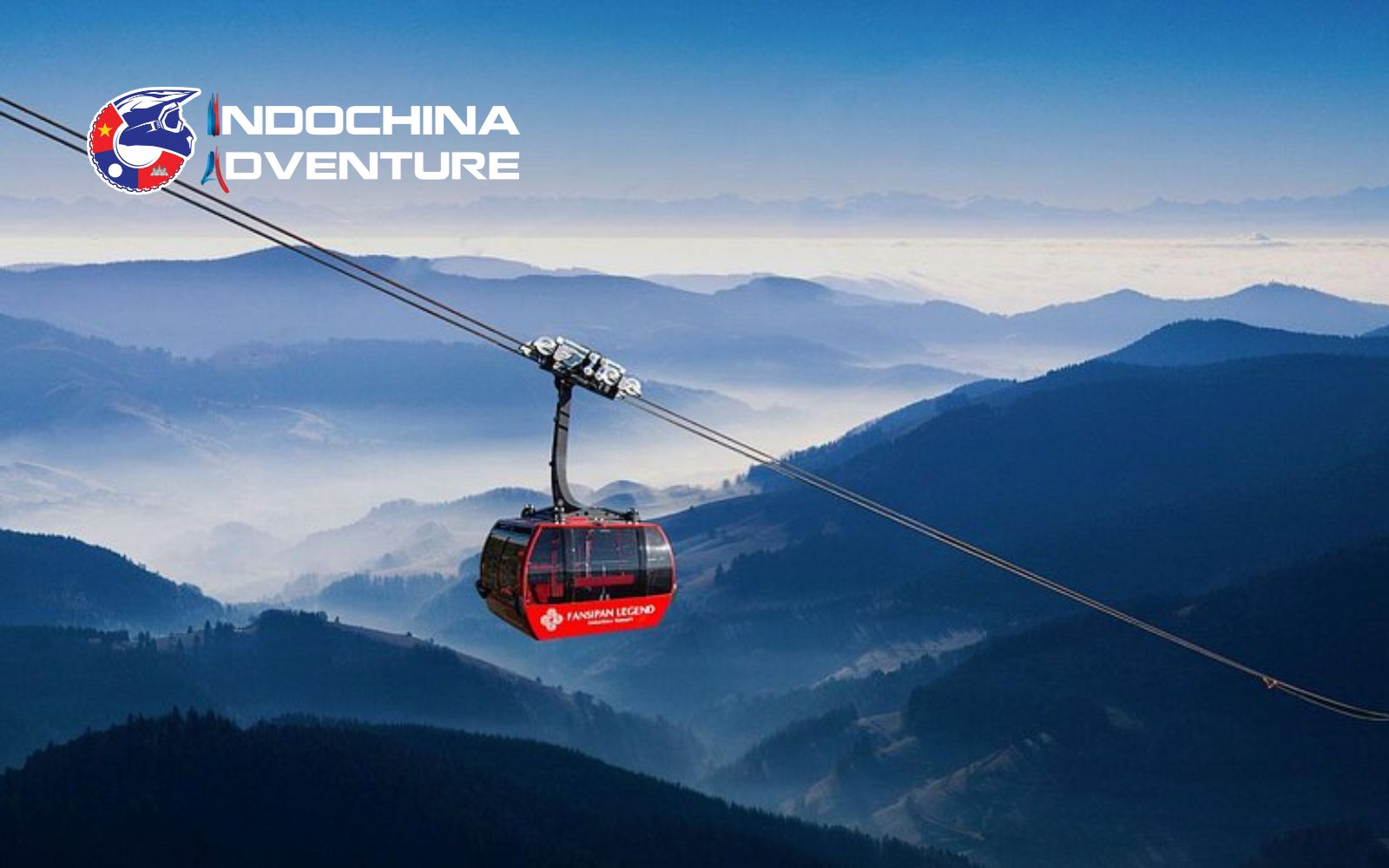 Admire sweeping aerial views of mountains and terraces from above Fansipan Cable Car Views in May